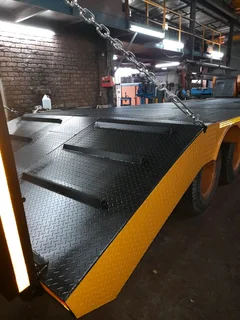 TOW TRUCK MANUFACTURER ROLL BACK FLOOR