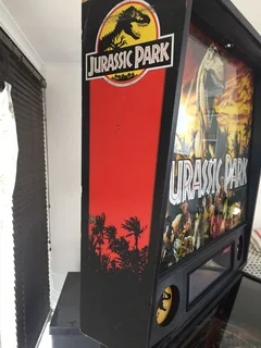 Data East Jurassic Park Pinball with topper in Excellent condition for sale
