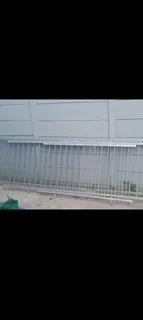 Galvanized Security Fencing with Spikes.