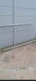 Galvanized Security Fencing with Spikes.