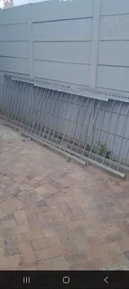 Galvanized Security Fencing with Spikes.