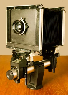 Sinar F in case and 135 mm lens and plate in good condition can ship WW