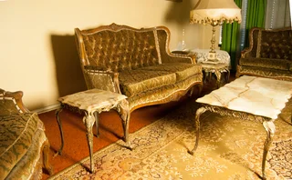 Lounge suite: Two two seater couches two chairs coffee table and two side tables