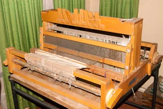 All imported 8 Shaft weaving loom and spinning wheel and bags of fleece