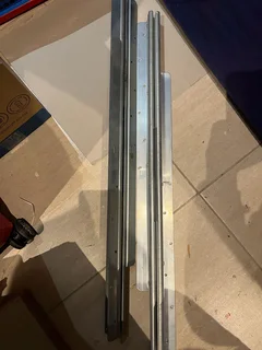 Pair steel table slides 180cm