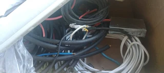 Cat Cable being stripped. We buy - renovating business premises of computer cable wiring.