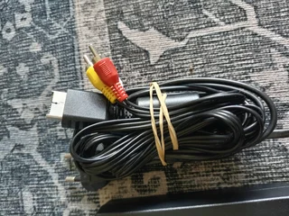 PlayStation 2 power brick and AV adapter - R50