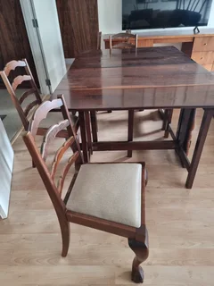 Solid wooden dining table & 6 chairs price negotiable