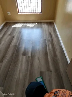 Laminate and vinly installation, screeding, skirtings and carpetiles as well