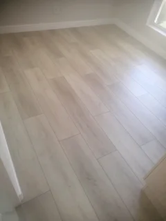 Laminate and vinly installation, screeding, skirtings and carpetiles as well