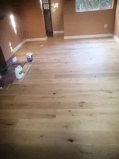 Laminate and vinly installation, screeding, skirtings and carpetiles as well