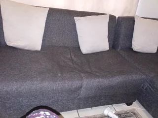 L shape couch R700 dent in two of the seats great for reupholster project.