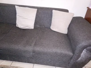 L shape couch R700 dent in two of the seats great for reupholster project.