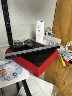 In Great Working Condition Nintendo Wii Mini Complete with Original Accessories &amp; Game Included…