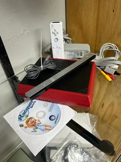 In Great Working Condition Nintendo Wii Mini Complete with Original Accessories &amp; Game Included…