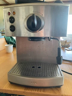 AEG espresso machine with frothing nozel P.S. no Scamers or dealers.