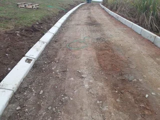 TARRING ROADS N DRIVEWAYS