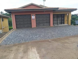 TARRING ROADS N DRIVEWAYS