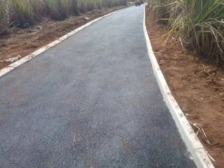 TARRING ROADS N DRIVEWAYS