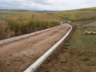 TARRING ROADS N DRIVEWAYS