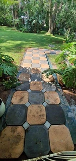 TARRING ROADS N DRIVEWAYS