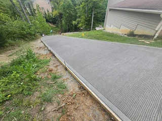 CONCRETE DRIVEWAYS N TAR ROADS