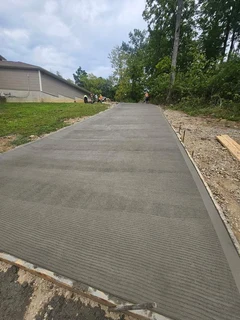 CONCRETE DRIVEWAYS N TAR ROADS