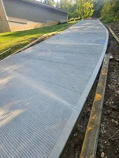 CONCRETE DRIVEWAYS N TAR ROADS