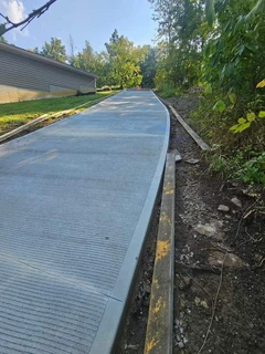 CONCRETE DRIVEWAYS N TAR ROADS