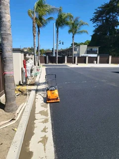 CONCRETE DRIVEWAYS N TAR ROADS