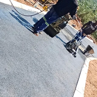 ASPHALT TAR PAVING ROADS N DRIVEWAYS
