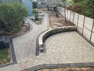 PAVING BRICK DRIVEWAYS