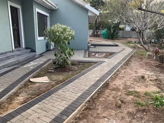 PAVING BRICK DRIVEWAYS