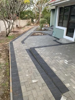 PAVING BRICK DRIVEWAYS