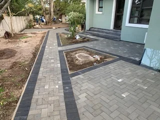 PAVING BRICK DRIVEWAYS