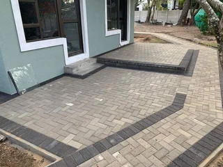 PAVING BRICK DRIVEWAYS