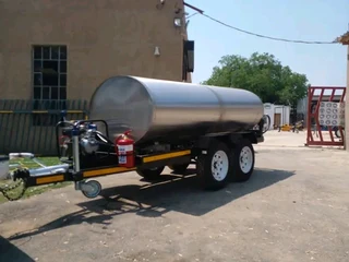 Silver Trailer  with km available now!