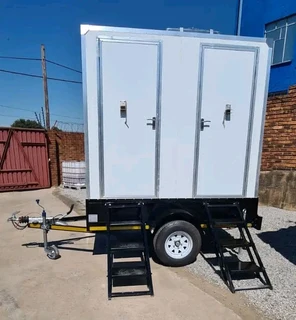 TWIN BETH TOILET TRAILERS
