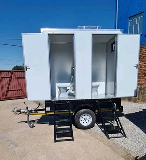 TWIN BETH TOILET TRAILERS
