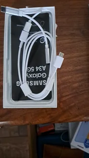 Green Samsung Galaxy A34 5G and included a Galaxy watch 4.Both items in good condition.(R1300)