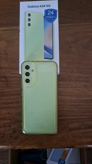 Green Samsung Galaxy A34 5G and included a Galaxy watch 4.Both items in good condition.(R1300)