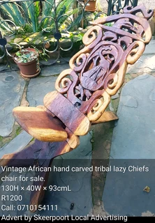 Vintage African tribal lazy chiefs chair for sale.