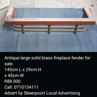 Antique large solid brass fireplace fender for sale.