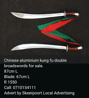Chinese aluminium Kung Fu double broadswords for sale.