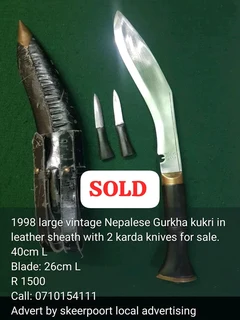1997 Large Nepalese Gurkha kukri in leather sheath with 2 karda knives for sale.