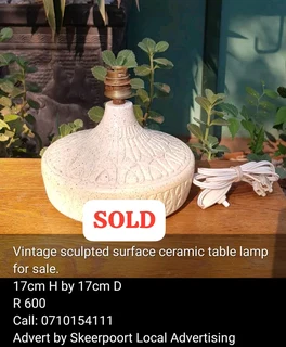 Vintage sculpted ceramic table lamp for sale.