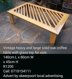Vintage heavy and large solid oak coffee table with glass top for sale