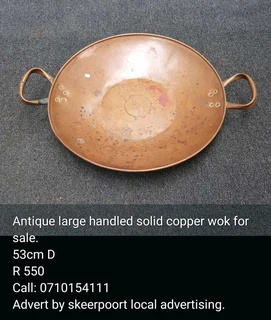 Antique large handled copper wok for sale.