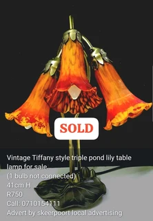 Vintage Tiffany style triple pond lily table lamp for sale.