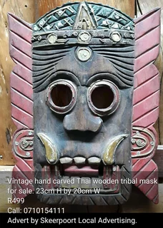 Vintage hand carved Thai wooden tribal mask for sale.